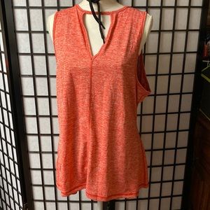 Excellent light weight tank top. Flared at the bottom. XXL